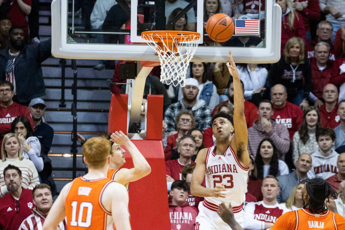 Trayce Jackson-Davis (23) shoots the ball while Illinois Fighting Illini forward Matthew Mayer (24) defends in the second half at Simon Skjodt Assembly Hall.